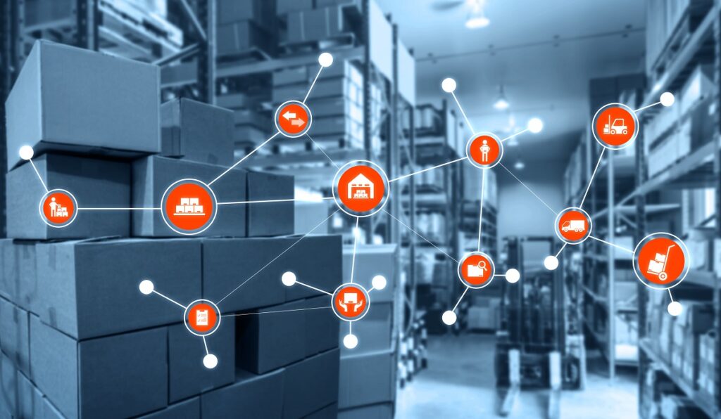 A warehouse filled with stacked boxes, overlaid with orange icons representing logistics, transportation, and inventory management connections.